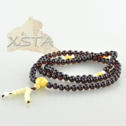 Tibetan Buddhist prayer butter and cherry amber rosary Tibetan Buddhist prayer butter and cherry amber rosary